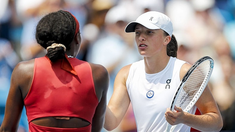 Aug 19, 2023; Mason, OH, USA; Iga Swiatek (POL) shakes hands with Coco Gauff (USA) after the match during the Western and Southern Open tennis tournament at Lindner Family Tennis Center. Mandatory Credit: Katie Stratman-USA TODAY Sports