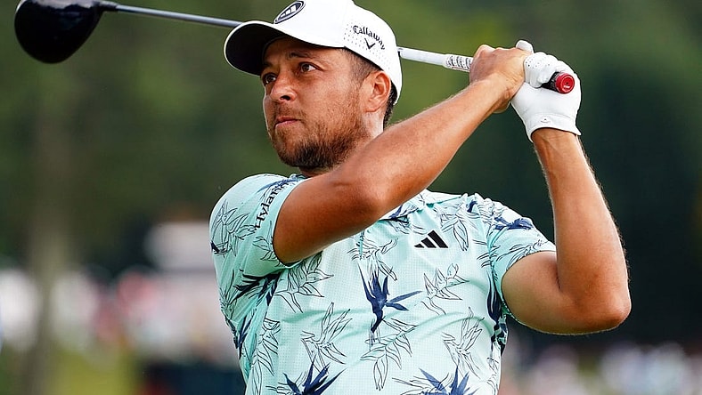 Aug 27, 2023; Atlanta, Georgia, USA; Xander Schauffele plays his shot from the sixth tee during the final round of the TOUR Championship golf tournament at East Lake Golf Club. Mandatory Credit: John David Mercer-USA TODAY Sports