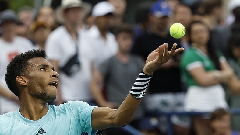 Aug 28, 2023; Flushing, NY, USA; Felix Auger-Aliassime of Canada serves against Mackenzie McDonald of the United States (not pictured) on day one of the 2023 US Open at the Billie Jean King National Tennis Center. Mandatory Credit: Geoff Burke-USA TODAY Sports