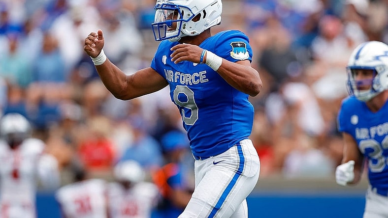 Sep 2, 2023; Colorado Springs, Colorado, USA; Air Force Falcons quarterback Zac Larrier (9) celebrates after scoring a touchdown in the third quarter against the Robert Morris Colonials at Falcon Stadium. Mandatory Credit: Isaiah J. Downing-USA TODAY Sports