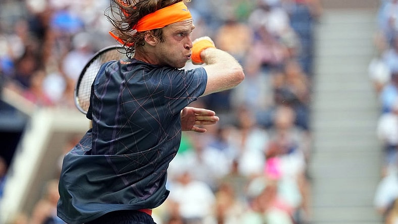 Sep 6, 2023; Flushing, NY, USA; Andrey Rublev hits to Daniil Medvedev on day ten of the 2023 U.S. Open tennis tournament at USTA Billie Jean King National Tennis Center. Mandatory Credit: Danielle Parhizkaran-USA TODAY Sports