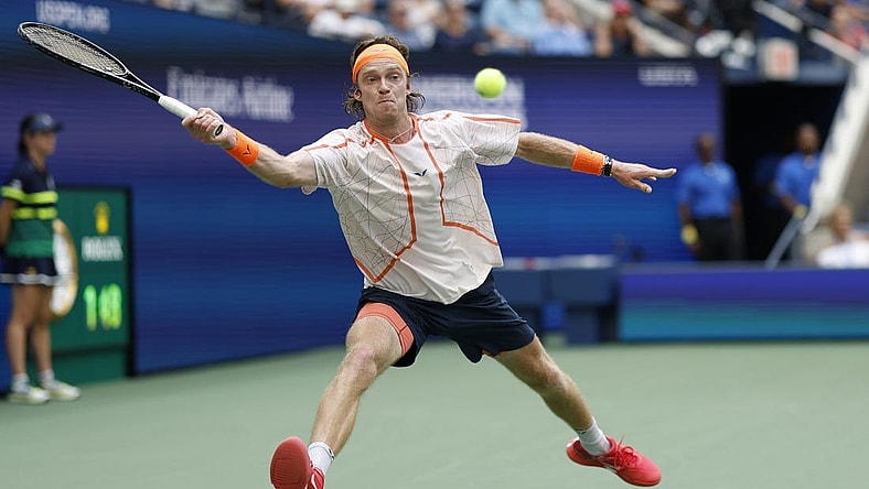 Sep 6, 2023; Flushing, NY, USA; Andrey Rublev reaches for a forehand against Daniil Medvedev (not pictured) on day ten of the 2023 U.S. Open tennis tournament at USTA Billie Jean King National Tennis Center. Mandatory Credit: Geoff Burke-USA TODAY Sports