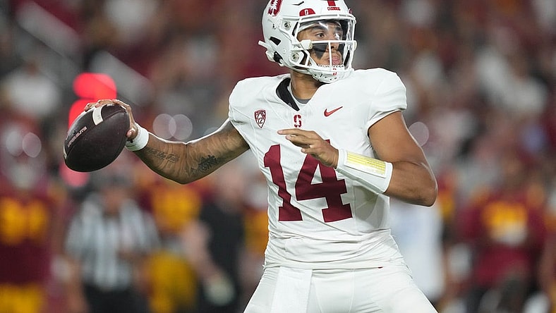 Sep 9, 2023; Los Angeles, California, USA; Stanford Cardinal quarterback Ashton Daniels (14) throws the ball against the Southern California Trojans in the first half at United Airlines Field at Los Angeles Memorial Coliseum. Mandatory Credit: Kirby Lee-USA TODAY Sports