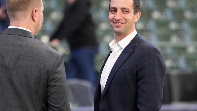 David Stearns on the field in Milwaukee before a game in 2022.