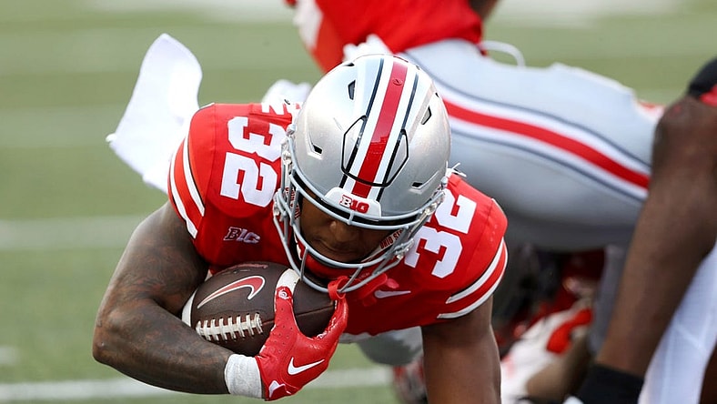 Sep 16, 2023; Columbus, Ohio, USA; Ohio State Buckeyes running back TreVeyon Henderson (32) runs during the second quarter against the Western Kentucky Hilltoppers at Ohio Stadium. Mandatory Credit: Joseph Maiorana-USA TODAY Sports