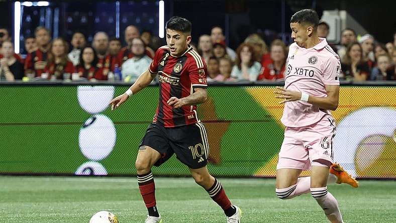 Sep 16, 2023; Atlanta, Georgia, USA; Atlanta United FC midfielder Thiago Almada (10) dribbles the ball as Inter Miami CF defender Tomas Aviles (6) defends at Mercedes-Benz Stadium. Mandatory Credit: Geoff Burke-USA TODAY Sports