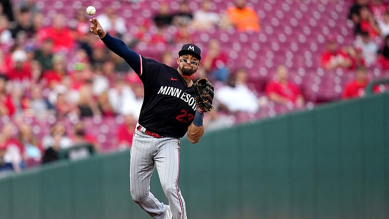 Minnesota Twins third baseman Royce Lewis (23) throws to first base for an out in the first inning of a baseball game against the Cincinnati Reds, Tuesday, Sept. 19, 2023, at Great American Ball Park in Cincinnati.
