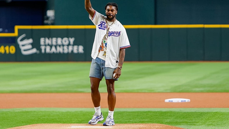 Sep 19, 2023; Arlington, Texas, USA;  Dallas Cowboys cornerback Trevon Diggs throws out the first pitch prior to the game between the Boston Red Sox and Texas Rangers at Globe Life Field. Mandatory Credit: Andrew Dieb-USA TODAY Sports