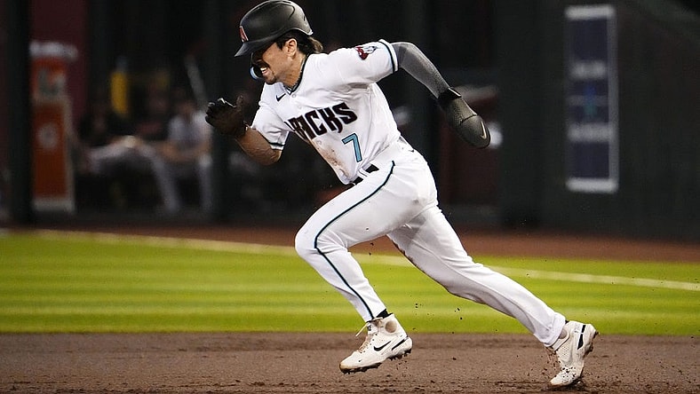 Arizona Diamondbacks Corbin Carroll (7) steals second base which is his 49th stolen base of his rookie season against the San Francisco Giants in the first inning at Chase Field in Phoenix on Sept. 20, 2023.