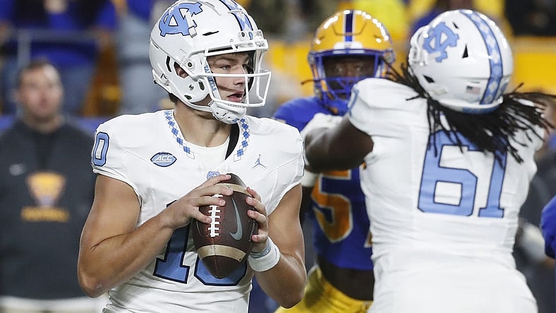 Sep 23, 2023; Pittsburgh, Pennsylvania, USA; North Carolina Tar Heels quarterback Drake Maye (10) looks to pass against the Pittsburgh Panthers during the first quarter at Acrisure Stadium. Mandatory Credit: Charles LeClaire-USA TODAY Sports