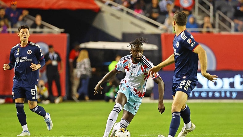 Sep 23, 2023; Chicago, Illinois, USA; Chicago Fire forward Kei Kamara (23) dribbles the ball against the New England Revolution during the first half at Soldier Field. Mandatory Credit: Mike Dinovo-USA TODAY Sports