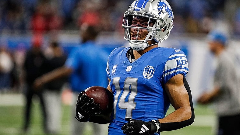 Detroit Lions wide receiver Amon-Ra St. Brown (14) warms up before the Atlanta Falcons game at Ford Field in Detroit on Sunday, Sept. 24, 2023.