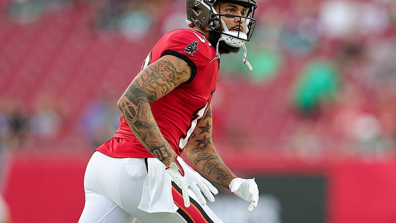 Sep 25, 2023; Tampa, Florida, USA;  Tampa Bay Buccaneers wide receiver Mike Evans (13) warms up before a game against the Philadelphia Eagles at Raymond James Stadium. Mandatory Credit: Nathan Ray Seebeck-USA TODAY Sports