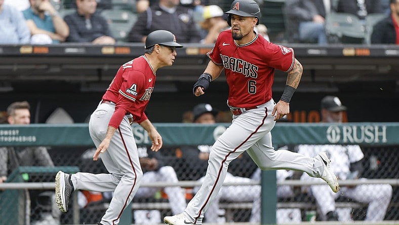 Sep 27, 2023; Chicago, Illinois, USA; Arizona Diamondbacks third baseman Jace Peterson (6) runs to score against the Chicago White Sox during the third inning at Guaranteed Rate Field. Mandatory Credit: Kamil Krzaczynski-USA TODAY Sports