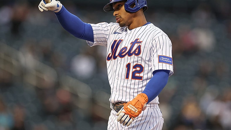 Sep 27, 2023; New York City, New York, USA; New York Mets shortstop Francisco Lindor (12) reacts after two RBI single during the seventh inning against the Miami Marlins at Citi Field. Mandatory Credit: Vincent Carchietta-USA TODAY Sports