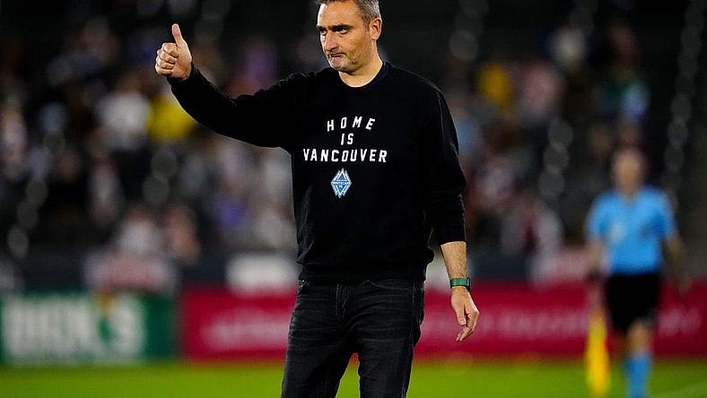 Sep 27, 2023; Commerce City, Colorado, USA; Vancouver Whitecaps FC head coach Vanni Sartini reacts in the first half against the Colorado Rapids at Dick's Sporting Goods Park. Mandatory Credit: Ron Chenoy-USA TODAY Sports