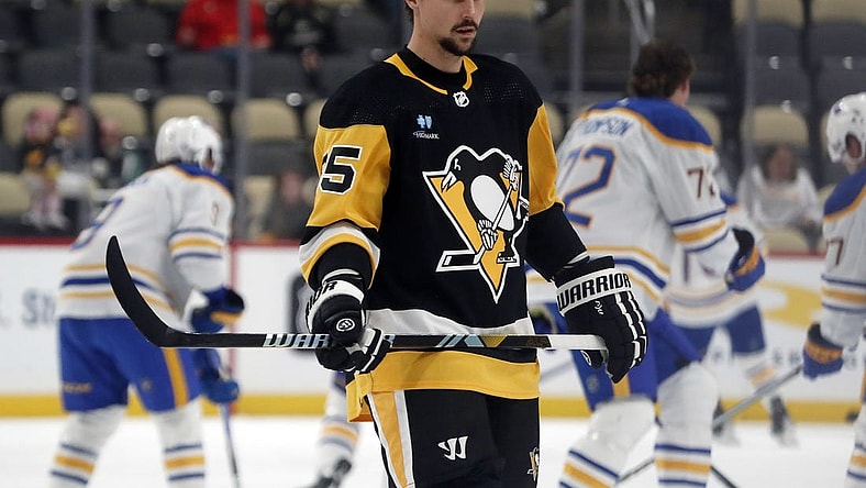 Sep 28, 2023; Pittsburgh, Pennsylvania, USA; Pittsburgh Penguins defenseman Erik Karlsson (65) warms up before the game against the Buffalo Sabres at PPG Paints Arena. Mandatory Credit: Charles LeClaire-USA TODAY Sports