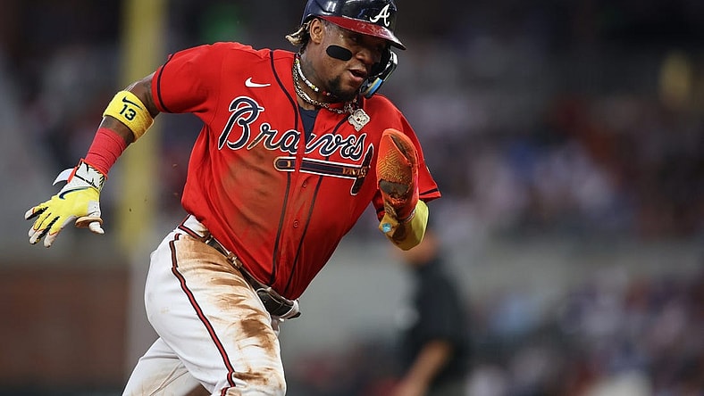 Sep 29, 2023; Atlanta, Georgia, USA; Atlanta Braves right fielder Ronald Acuna Jr. (13) rounds third against the Washington Nationals in the first inning at Truist Park. Mandatory Credit: Brett Davis-USA TODAY Sports