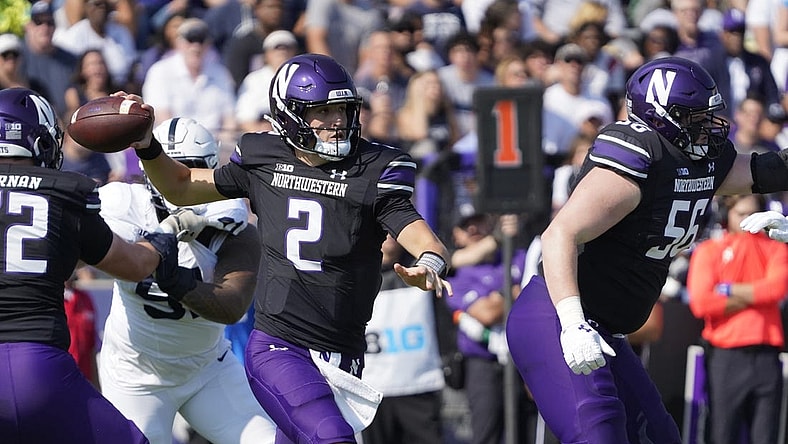 Sep 30, 2023; Evanston, Illinois, USA; Northwestern Wildcats quarterback Ben Bryant (2) passes against the Penn State Nittany Lions during the first half at Ryan Field. Mandatory Credit: David Banks-USA TODAY Sports