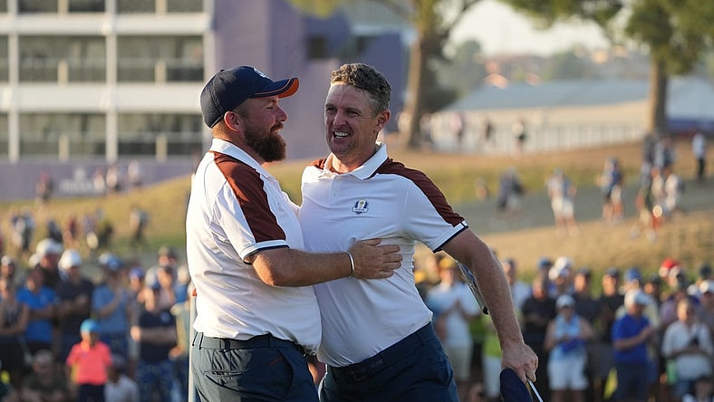 Sep 30, 2023; Rome, ITALY;  Team Europe golfer Shane Lowry and Team Europe golfer Justin Rose celebrate on the 16th hole during day two fourballs round for the 44th Ryder Cup golf competition at Marco Simone Golf and Country Club. Mandatory Credit: Kyle Terada-USA TODAY Sports
