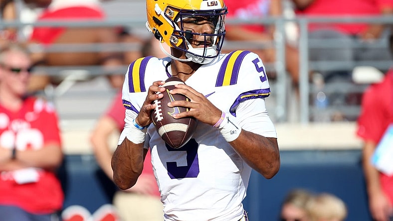 Sep 30, 2023; Oxford, Mississippi, USA; LSU Tigers quarterback Jayden Daniels (5) warms ups prior to the game against the Mississippi Rebels at Vaught-Hemingway Stadium. Mandatory Credit: Petre Thomas-USA TODAY Sports