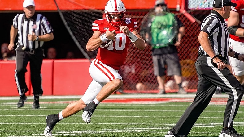 Sep 30, 2023; Lincoln, Nebraska, USA; Nebraska Cornhuskers quarterback Heinrich Haarberg (10) runs against the Michigan Wolverines during the second quarter at Memorial Stadium. Mandatory Credit: Dylan Widger-USA TODAY Sports