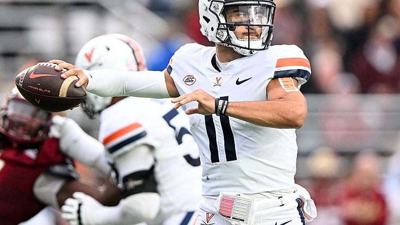 Sep 30, 2023; Chestnut Hill, Massachusetts, USA; Virginia Cavaliers quarterback Tony Muskett (11) passes the ball against the Boston College Eagles during the second half at Alumni Stadium. Mandatory Credit: Brian Fluharty-USA TODAY Sports