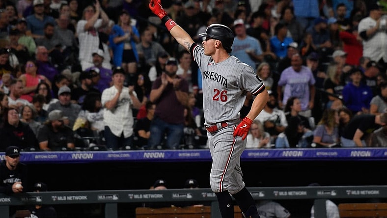 Sep 30, 2023; Denver, Colorado, USA; Minnesota Twins right fielder Max Kepler (26) points to the stands after his three run home run in the sixth inning against the Colorado Rockies at Coors Field. Mandatory Credit: John Leyba-USA TODAY Sports