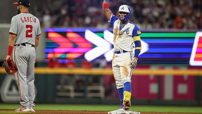 Sep 30, 2023; Atlanta, Georgia, USA; Atlanta Braves right fielder Ronald Acuna Jr. (13) reacts after a double against the Washington Nationals in the fifth inning at Truist Park. Mandatory Credit: Brett Davis-USA TODAY Sports