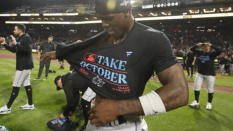 Sep 30, 2023; Pittsburgh, Pennsylvania, USA;  Miami Marlins center fielder Jazz Chisholm Jr. (2) celebrates on the field after the Marlins defeated the Pittsburgh Pirates at PNC Park to secure a berth in the 2023 MLB playoffs. Miami won 7-4.  Mandatory Credit: Charles LeClaire-USA TODAY Sports