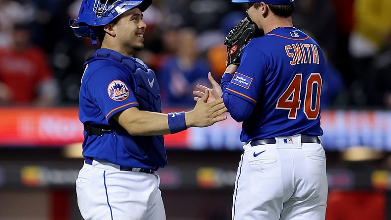 Sep 30, 2023; New York City, New York, USA; New York Mets catcher Francisco Alvarez (4) celebrates with relief pitcher Drew Smith (40) after defeating the Philadelphia Phillies at Citi Field. Mandatory Credit: Brad Penner-USA TODAY Sports
