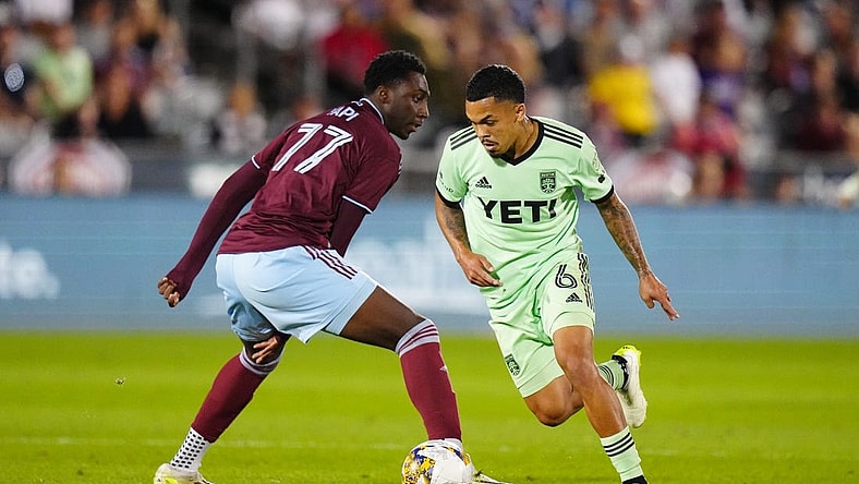 Sep 30, 2023; Commerce City, Colorado, USA; Austin FC midfielder Daniel Pereira (6) steals the ball away from Colorado Rapids forward Darren Yapi (77) in the second half at Dick's Sporting Goods Park. Mandatory Credit: Ron Chenoy-USA TODAY Sports