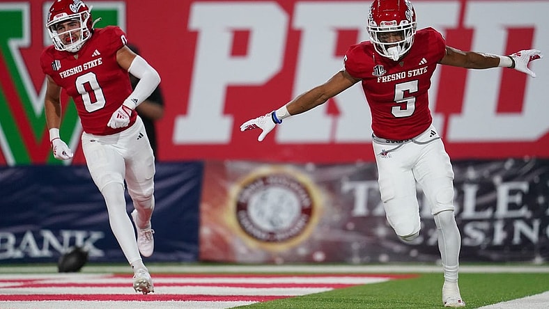 Sep 30, 2023; Fresno, California, USA; Fresno State Bulldogs wide receiver Jaelen Gill (5) reacts after catching a pass for a touchdown against the Nevada Wolf Pack in the first quarter at Valley Children's Stadium. Mandatory Credit: Cary Edmondson-USA TODAY Sports