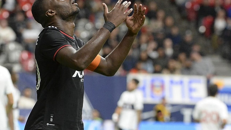 Sep 30, 2023; Vancouver, British Columbia, CAN;  D.C. United forward Christian Benteke (20) reacts during the second half against the Vancouver Whitecaps FC at BC Place. Mandatory Credit: Anne-Marie Sorvin-USA TODAY Sports