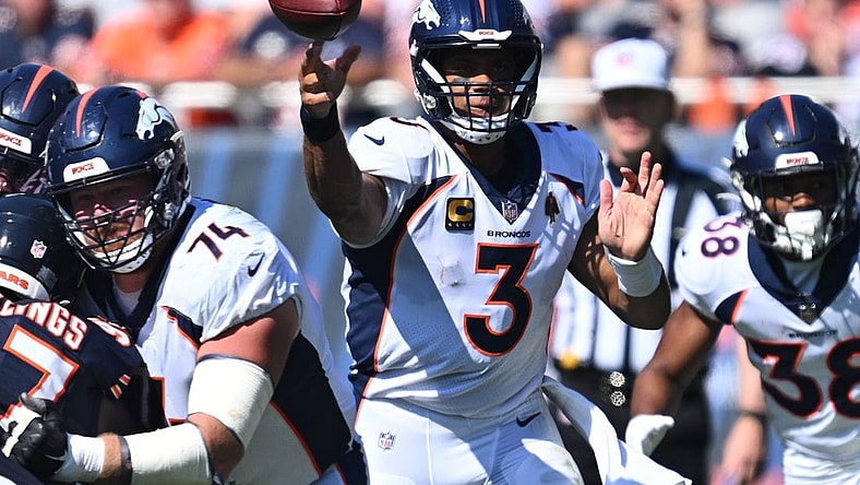 Oct 1, 2023; Chicago, Illinois, USA;  Denver Broncos quarterback Russell Wilson (3) passes in the second quarter against the Chicago Bears at Soldier Field. Mandatory Credit: Jamie Sabau-USA TODAY Sports