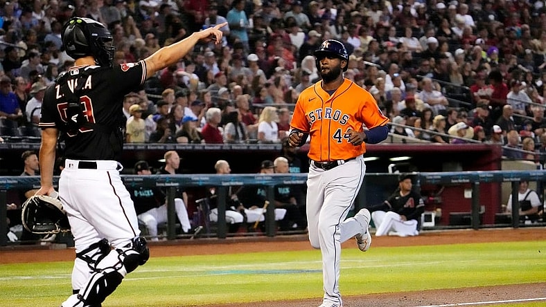 Oct 1, 2023; Phoenix, AZ, USA; Houston Astros Yordan Alvarez (44) scores on an error by the Arizona Diamondbacks in the first inning at Chase Field. Mandatory Credit: Rob Schumacher-Arizona Republic