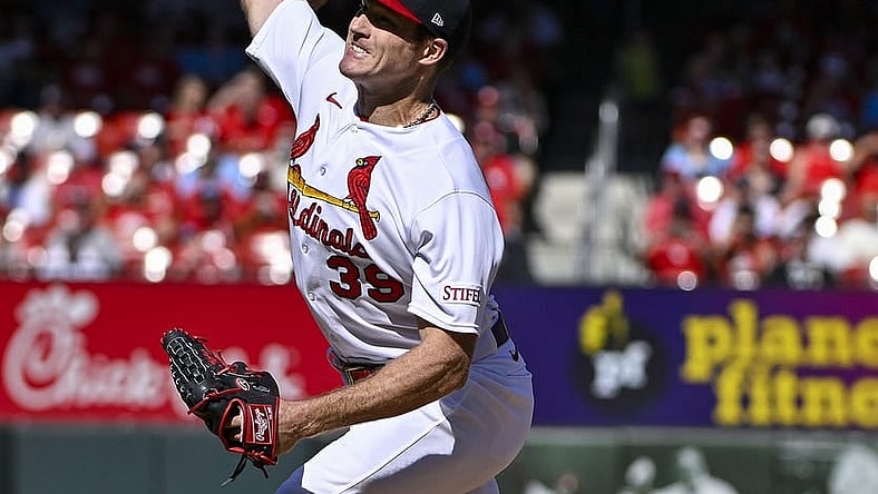 Oct 1, 2023; St. Louis, Missouri, USA;  St. Louis Cardinals starting pitcher Miles Mikolas (39) pitches against the Cincinnati Reds during the first inning at Busch Stadium. Mandatory Credit: Jeff Curry-USA TODAY Sports