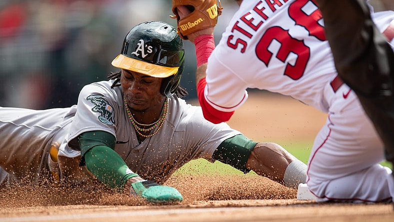 Oct 1, 2023; Anaheim, California, USA; Oakland Athletics right fielder Esteury Ruiz (1) steals second base against Los Angeles Angels second baseman Michael Stefanic (38) during the third inning at Angel Stadium. Mandatory Credit: Jonathan Hui-USA TODAY Sports