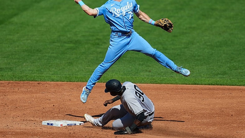 Oct 1, 2023; Kansas City, Missouri, USA; Kansas City Royals shortstop Bobby Witt Jr. (7) throws to first base after forcing out New York Yankees center fielder Estevan Florial (90) during the third inning at Kauffman Stadium. Mandatory Credit: Jay Biggerstaff-USA TODAY Sports
