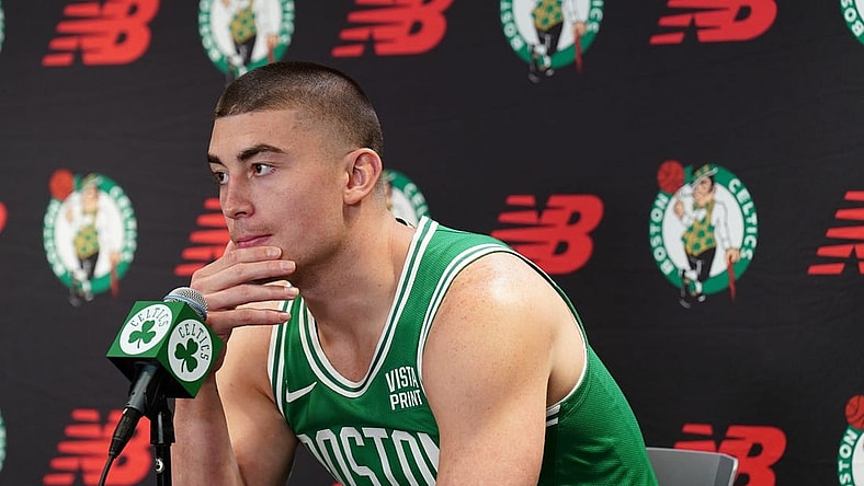 Oct 2, 2023; Boston, Celtics, USA; Boston Celtics guard Payton Pritchard (11) talks with sports media during Boston Celtics Media Day. Mandatory Credit: David Butler II-USA TODAY Sports