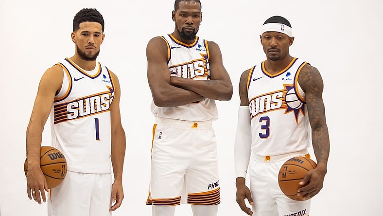 Oct 2, 2023; Phoenix, AZ, USA; Phoenix Suns guard Devin Booker (1), forward Kevin Durant (35) and guard Bradley Beal (3) pose for a portrait during media day at Footprint Center. Mandatory Credit: Mark J. Rebilas-USA TODAY Sports