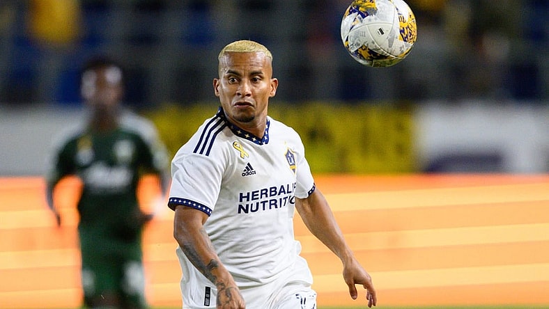 Sep 30, 2023; Carson, California, USA; LA Galaxy forward Michael Barrios (12) chases down the ball during the second half at Dignity Health Sports Park. Mandatory Credit: Kelvin Kuo-USA TODAY Sports