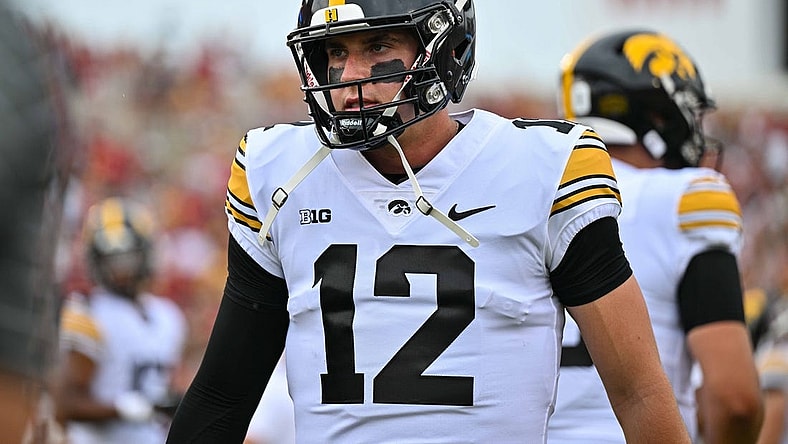 Sep 9, 2023; Ames, Iowa, USA; Iowa Hawkeyes quarterback Cade McNamara (12) looks on before the game against the Iowa State Cyclones at Jack Trice Stadium. Mandatory Credit: Jeffrey Becker-USA TODAY Sports