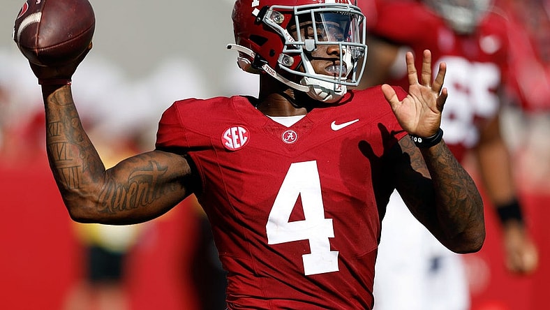 Sep 23, 2023; Tuscaloosa, Alabama, USA;  Alabama Crimson Tide quarterback Jalen Milroe (4) throws a pass against the Mississippi Rebels during the first half at Bryant-Denny Stadium. Mandatory Credit: Butch Dill-USA TODAY Sports