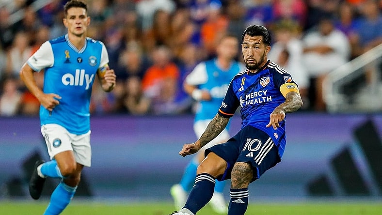 Sep 23, 2023; Cincinnati, Ohio, USA; FC Cincinnati midfielder Luciano Acosta (10) dribbles against Charlotte FC in the first half at TQL Stadium. Mandatory Credit: Katie Stratman-USA TODAY Sports