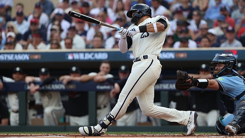 Oct 3, 2023; Minneapolis, Minnesota, USA; Minnesota Twins short stop Royce Lewis (23) hits a two-run home run in the first inning against the Toronto Blue Jays during game one of the Wildcard series for the 2023 MLB playoffs at Target Field. Mandatory Credit: Jesse Johnson-USA TODAY Sports