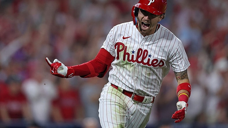 Oct 3, 2023; Philadelphia, Pennsylvania, USA; Philadelphia Phillies second baseman Bryson Stott (5) reacts after hitting a RBI single in the fourth inning against the Miami Marlins for game one of the Wildcard series for the 2023 MLB playoffs at Citizens Bank Park. Mandatory Credit: Bill Streicher-USA TODAY Sports