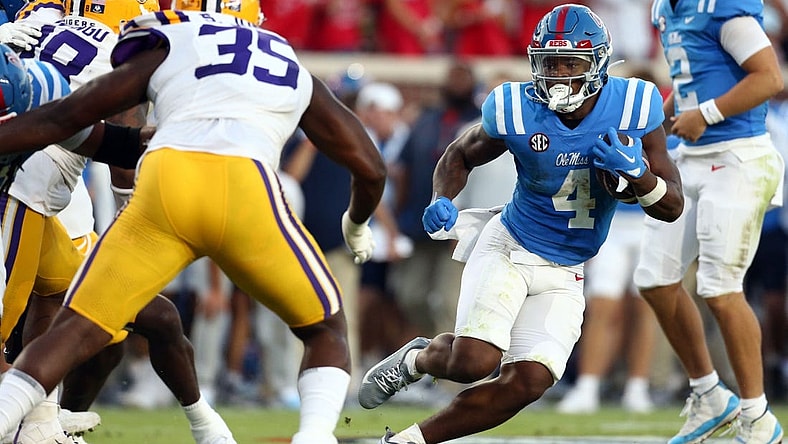 Sep 30, 2023; Oxford, Mississippi, USA; Mississippi Rebels running back Quinshon Judkins (4) runs the ball  during the first half against the LSU Tigers at Vaught-Hemingway Stadium. Mandatory Credit: Petre Thomas-USA TODAY Sports
