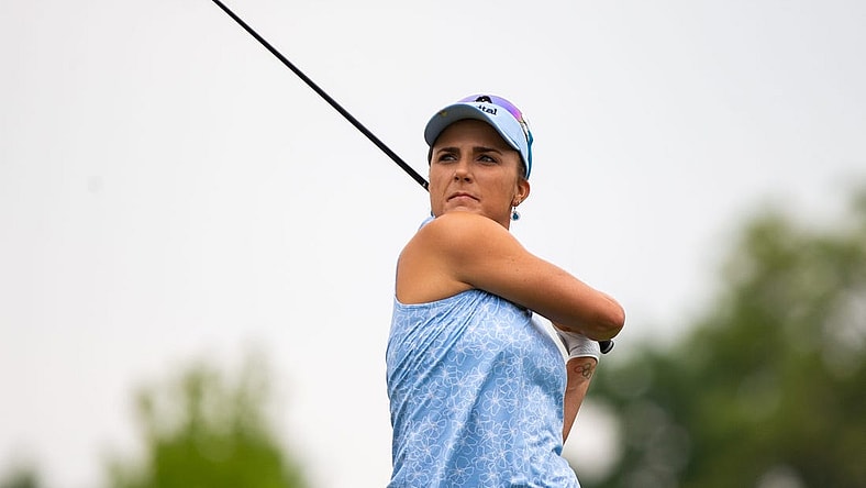 Lexi Thompson drives the ball down the fairway after teeing off in the Meijer LPGA Classic at Blythefield Country Club in Belmont, Mich., on June 15, 2023.