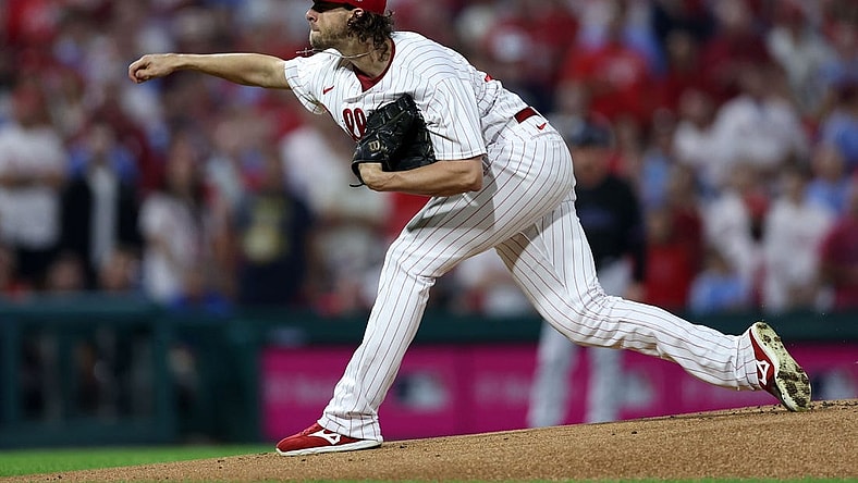 Oct 4, 2023; Philadelphia, Pennsylvania, USA; Philadelphia Phillies starting pitcher Aaron Nola (27) throws a pitch against the Miami Marlins during the first inning for game two of the Wildcard series for the 2023 MLB playoffs at Citizens Bank Park. Mandatory Credit: Bill Streicher-USA TODAY Sports